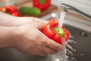 person-washing-red-pepper